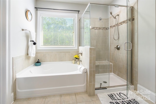 461 Swift Creek Cv, Clover, SC 29710 - full bathroom featuring a garden tub, a stall shower, and tile patterned flooring