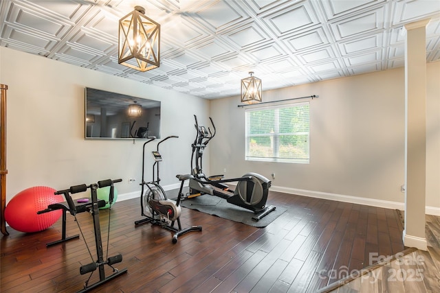 461 Swift Creek Cv, Clover, SC 29710 - workout room with dark wood-style flooring, a chandelier, and an ornate ceiling