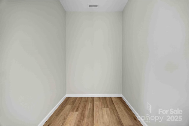 2325 32nd St NE, Hickory, NC 28601 - spare room featuring wood finished floors and baseboards