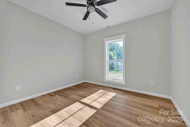 2325 32nd St NE, Hickory, NC 28601 - empty room featuring wood finished floors and ceiling fan