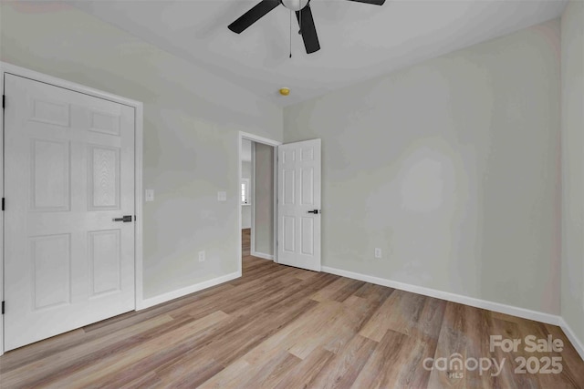 2325 32nd St NE, Hickory, NC 28601 - unfurnished bedroom with light wood finished floors and a ceiling fan