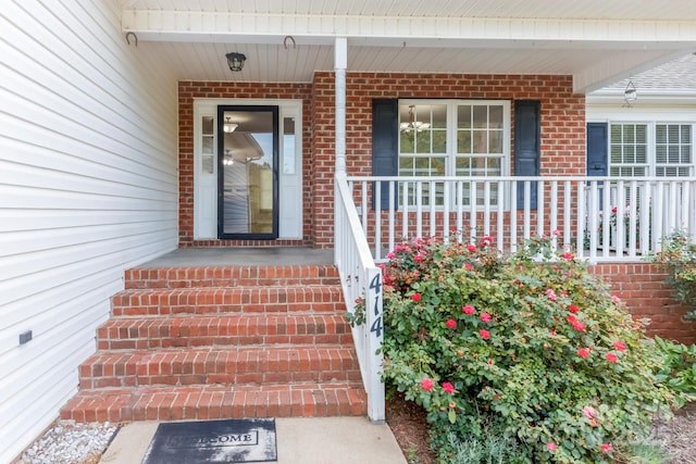 414 Bob Hardin Rd, Rutherfordton, NC 28139 - doorway to property with covered porch and brick siding
