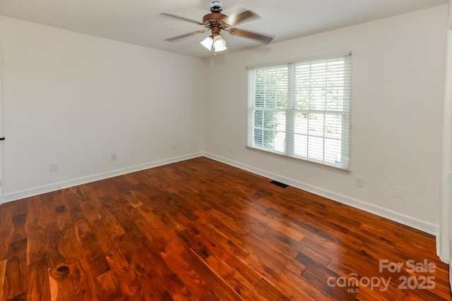 414 Bob Hardin Rd, Rutherfordton, NC 28139 - spare room featuring a ceiling fan and dark wood-style floors