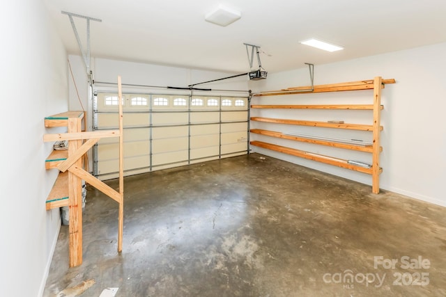 414 Bob Hardin Rd, Rutherfordton, NC 28139 - garage featuring a garage door opener and baseboards