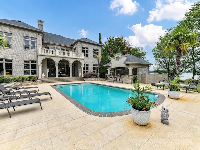 18201 Mainsail Pointe Dr, Cornelius, NC 28031 - outdoor pool with a patio and exterior bar