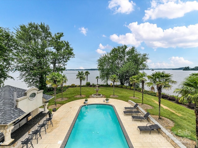 18201 Mainsail Pointe Dr, Cornelius, NC 28031 - swimming pool featuring a water view, a yard, and a patio area