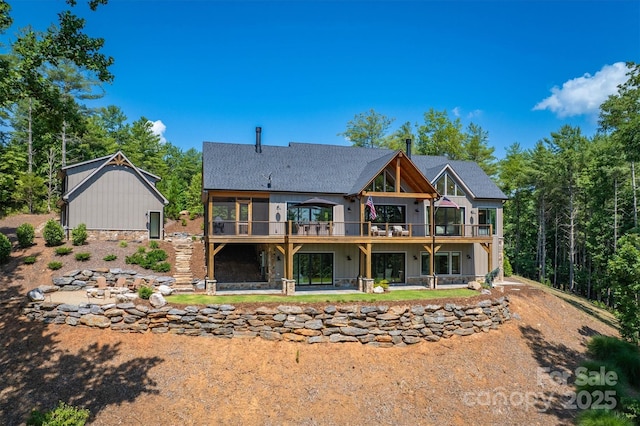 256 Hunt Camp Dr, Nebo, NC 28761 - back of property with a wooden deck, board and batten siding, and a patio