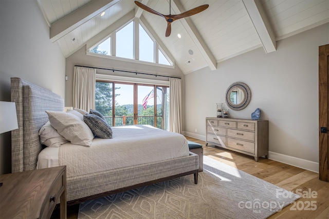 256 Hunt Camp Dr, Nebo, NC 28761 - bedroom with light wood finished floors, beam ceiling, high vaulted ceiling, and a ceiling fan