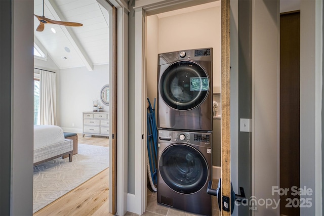 256 Hunt Camp Dr, Nebo, NC 28761 - laundry room with stacked washer / drying machine, wood finished floors, and a ceiling fan