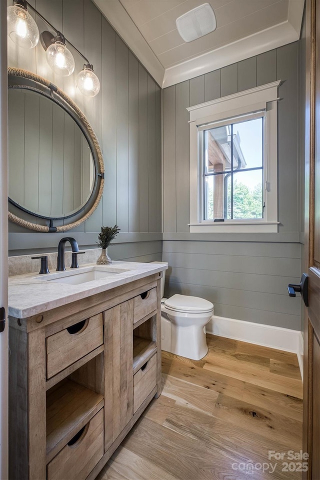 256 Hunt Camp Dr, Nebo, NC 28761 - half bathroom with wood finished floors, vanity, and ornamental molding