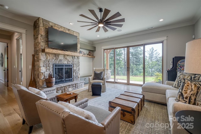 256 Hunt Camp Dr, Nebo, NC 28761 - living area featuring a fireplace, light wood-type flooring, crown molding, a ceiling fan, and recessed lighting