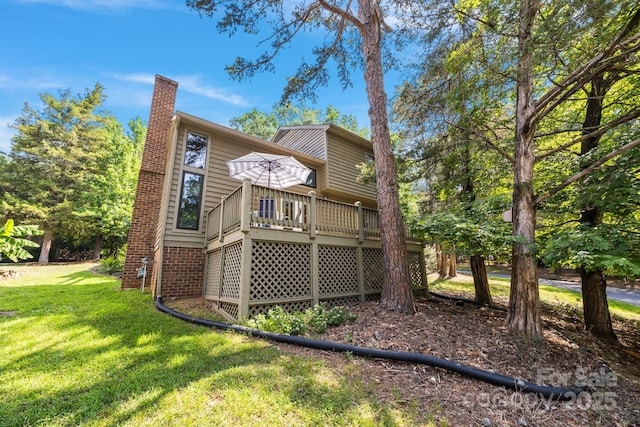 9008 St Croix Ln, Charlotte, NC 28277 - rear view of property with a chimney, a lawn, and a deck