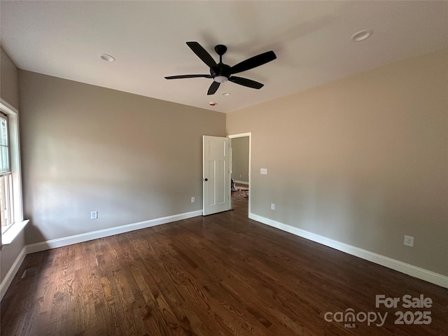 1031 Long Dr, Newton, NC 28658 - unfurnished room featuring dark wood-type flooring, a ceiling fan, and recessed lighting