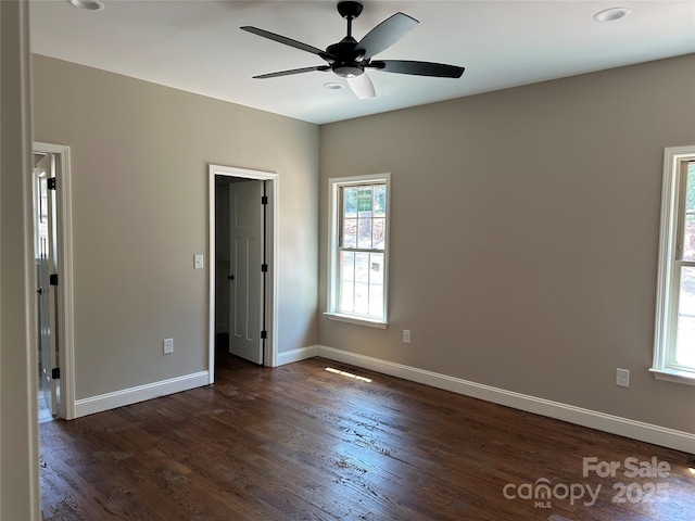 1031 Long Dr, Newton, NC 28658 - unfurnished bedroom with dark wood-type flooring and ceiling fan