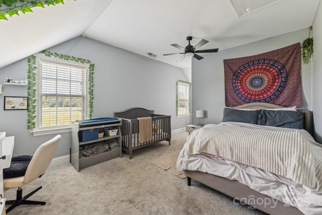 1123 Snyders Store Rd, Wingate, NC 28174 - bedroom with vaulted ceiling, attic access, carpet flooring, and a ceiling fan