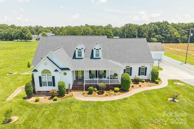 1123 Snyders Store Rd, Wingate, NC 28174 - cape cod house with covered porch, crawl space, a front lawn, and driveway