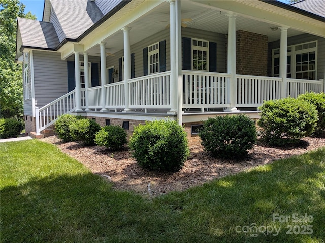 6301 Hawk Nest Dr, Concord, NC 28027 - view of side of home with a porch, a shingled roof, and crawl space