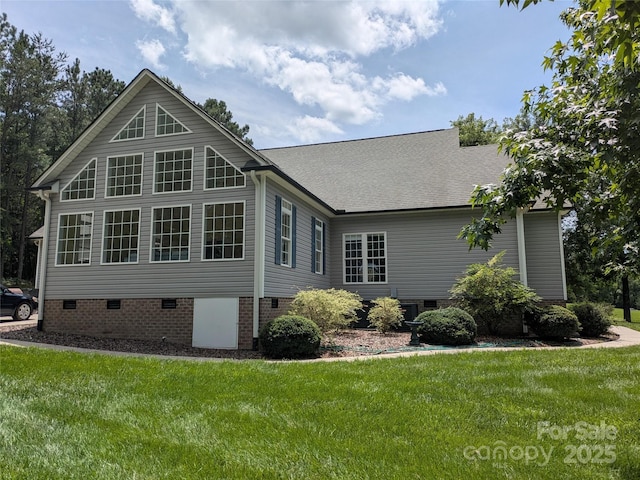 6301 Hawk Nest Dr, Concord, NC 28027 - back of house featuring crawl space, a yard, and roof with shingles