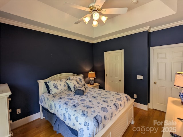 6301 Hawk Nest Dr, Concord, NC 28027 - bedroom featuring wood finished floors and a ceiling fan