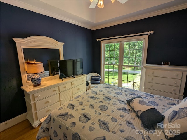 6301 Hawk Nest Dr, Concord, NC 28027 - bedroom with wood finished floors, ornamental molding, and a ceiling fan
