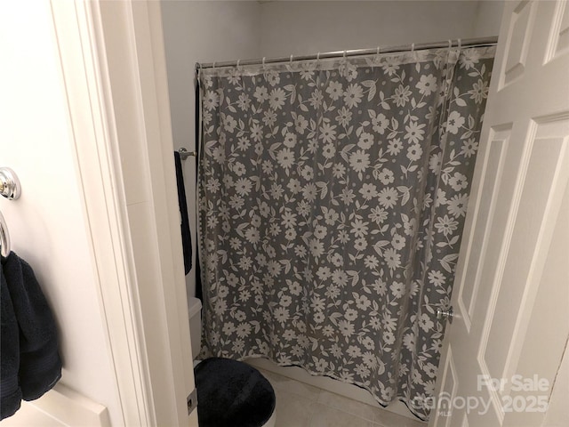 6301 Hawk Nest Dr, Concord, NC 28027 - bathroom featuring a shower with shower curtain and tile patterned flooring