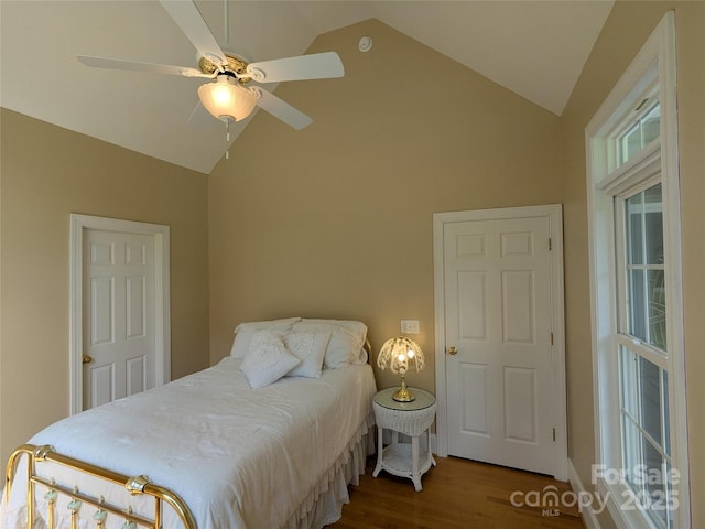 6301 Hawk Nest Dr, Concord, NC 28027 - bedroom featuring wood finished floors, high vaulted ceiling, and a ceiling fan