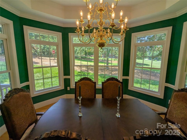6301 Hawk Nest Dr, Concord, NC 28027 - dining area with plenty of natural light, a chandelier, crown molding, and a tray ceiling