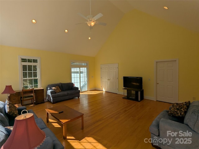 6301 Hawk Nest Dr, Concord, NC 28027 - living room with high vaulted ceiling, ceiling fan, wood finished floors, and recessed lighting