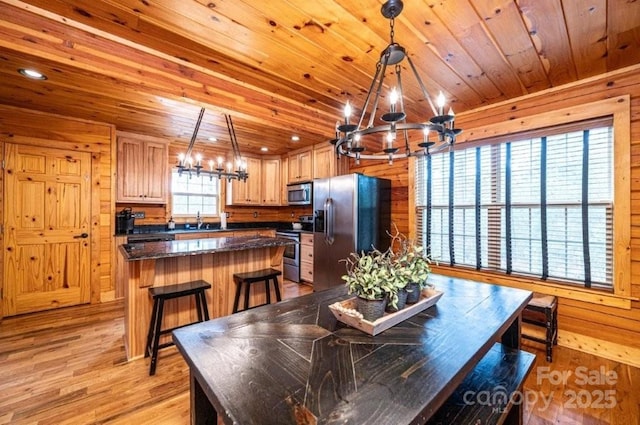 1818 W Paradise Harbor Dr Unit 172, Connelly Springs, NC 28612 - dining space with a chandelier, wooden ceiling, light wood-type flooring, wooden walls, and recessed lighting