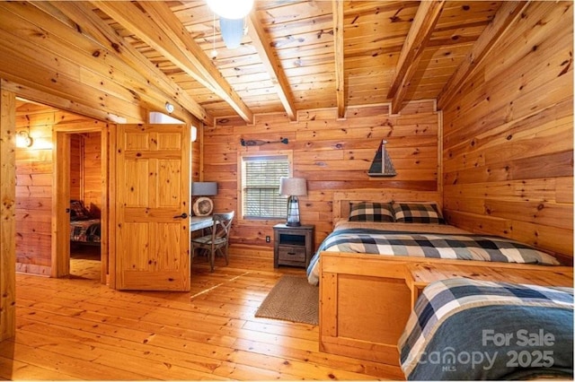 1818 W Paradise Harbor Dr Unit 172, Connelly Springs, NC 28612 - bedroom featuring a wooden ceiling with exposed beams, wood walls, and light wood-type flooring