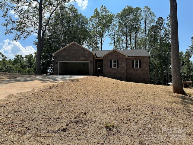 1045 Long Dr, Newton, NC 28658 - ranch-style home with brick siding, a garage, concrete driveway, and crawl space