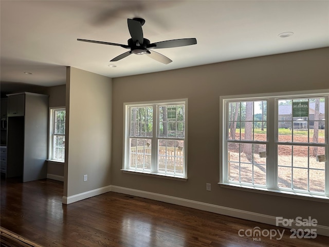 1045 Long Dr, Newton, NC 28658 - unfurnished room featuring dark wood-style flooring and a ceiling fan
