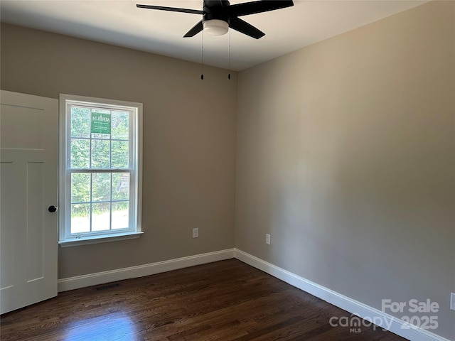 1045 Long Dr, Newton, NC 28658 - unfurnished room with dark wood finished floors and a ceiling fan