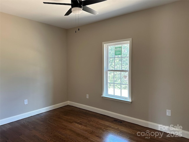 1045 Long Dr, Newton, NC 28658 - spare room with plenty of natural light, dark wood finished floors, and ceiling fan