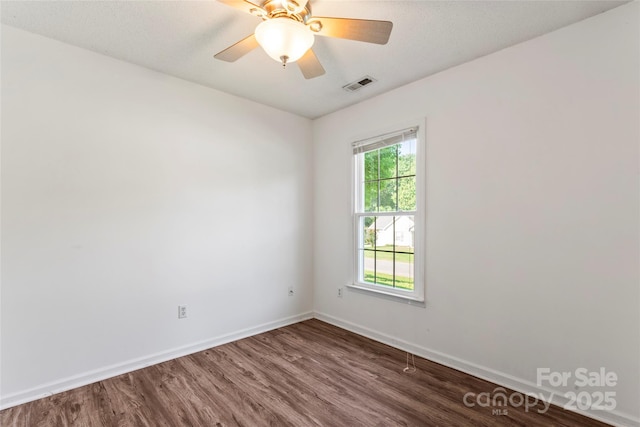 600 Piper Ct, Wingate, NC 28174 - unfurnished room featuring wood finished floors and a ceiling fan