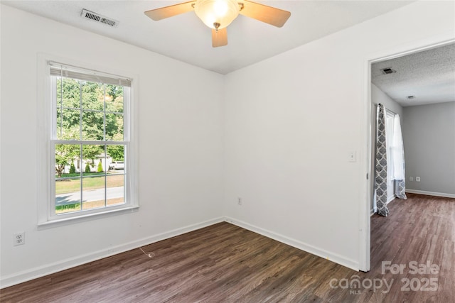 600 Piper Ct, Wingate, NC 28174 - unfurnished room featuring dark wood-type flooring and a ceiling fan