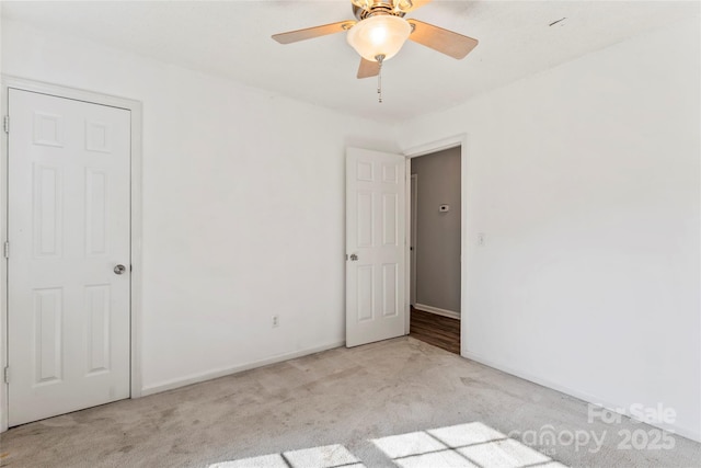 600 Piper Ct, Wingate, NC 28174 - unfurnished bedroom featuring carpet floors and a ceiling fan