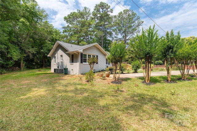 1641 Converse St, Lancaster, SC 29720 - view of property exterior featuring brick siding and a yard
