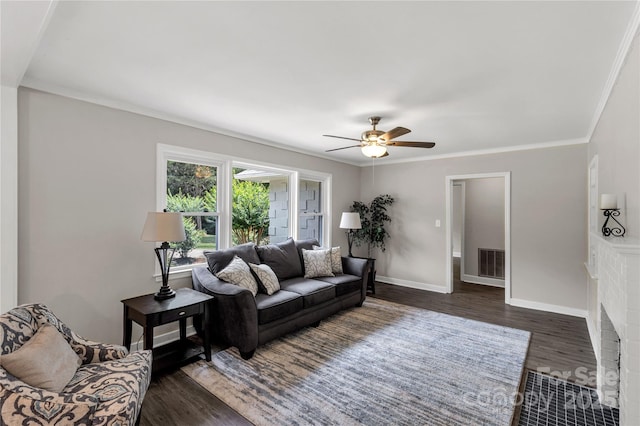 1641 Converse St, Lancaster, SC 29720 - living area with dark wood finished floors, ceiling fan, and crown molding