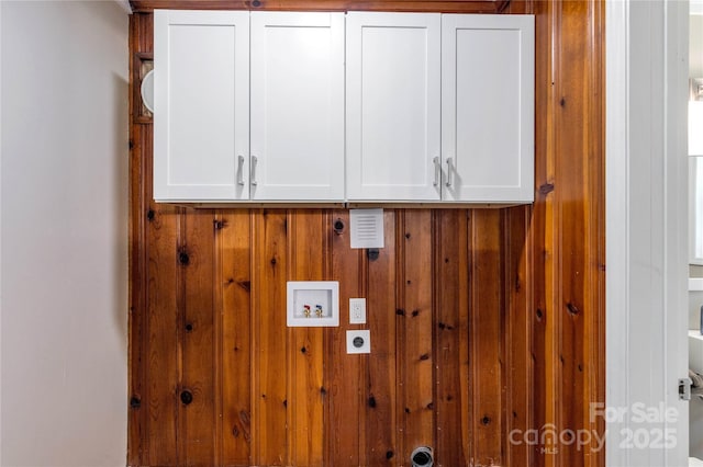 1641 Converse St, Lancaster, SC 29720 - washroom with hookup for an electric dryer, washer hookup, cabinet space, and wooden walls