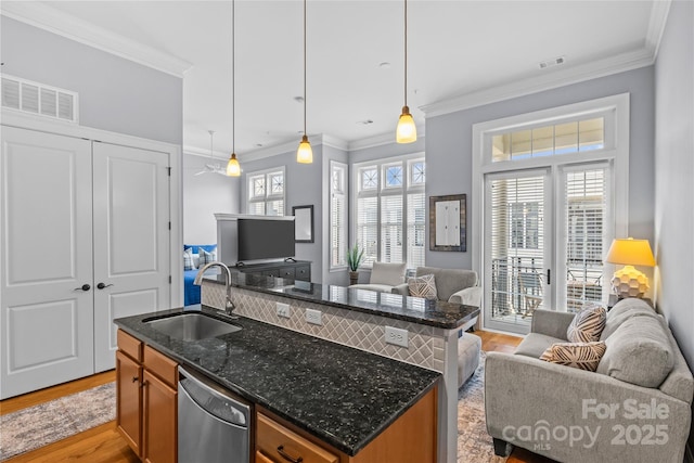 2810 Selwyn Ave Unit 429, Charlotte, NC 28209 - kitchen featuring open floor plan, stainless steel dishwasher, brown cabinetry, light wood-style floors, and crown molding