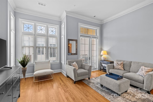 2810 Selwyn Ave Unit 429, Charlotte, NC 28209 - living room featuring light wood-style floors and crown molding