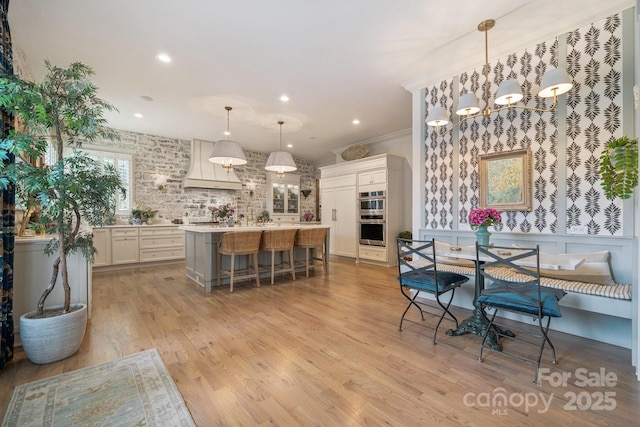 3519 Mcpherson St, Waxhaw, NC 28173 - dining space featuring a chandelier, light wood-style flooring, and recessed lighting