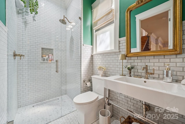 3519 Mcpherson St, Waxhaw, NC 28173 - full bath featuring a shower stall, wainscoting, and tile walls