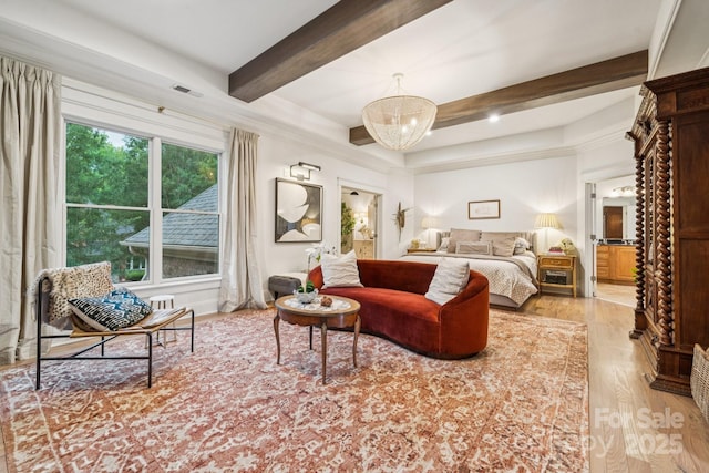 3519 Mcpherson St, Waxhaw, NC 28173 - bedroom with wood finished floors, beam ceiling, a chandelier, and ensuite bathroom