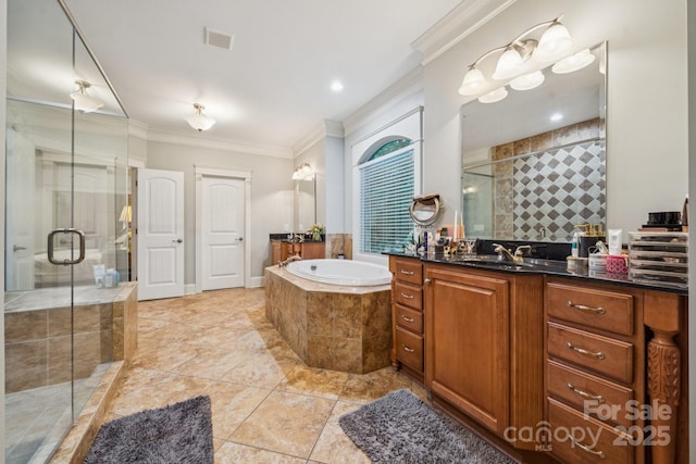 3519 Mcpherson St, Waxhaw, NC 28173 - bathroom featuring crown molding, vanity, a stall shower, a garden tub, and tile patterned floors