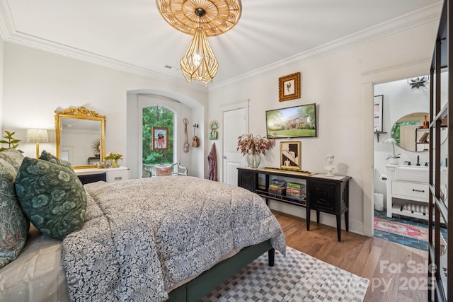 3519 Mcpherson St, Waxhaw, NC 28173 - bedroom with wood finished floors, ornamental molding, and arched walkways