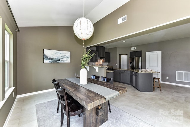 3533 Catherine Creek Pl, Davidson, NC 28036 - dining space with baseboards and high vaulted ceiling