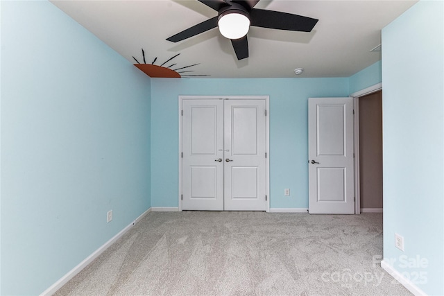 3533 Catherine Creek Pl, Davidson, NC 28036 - unfurnished bedroom featuring carpet flooring, a closet, and a ceiling fan