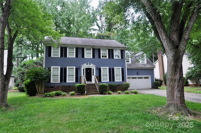 1324 Golden Hill Rd, Matthews, NC 28105 - colonial-style house with a front yard, concrete driveway, and a garage